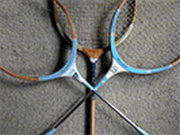 crossed badminton racquets